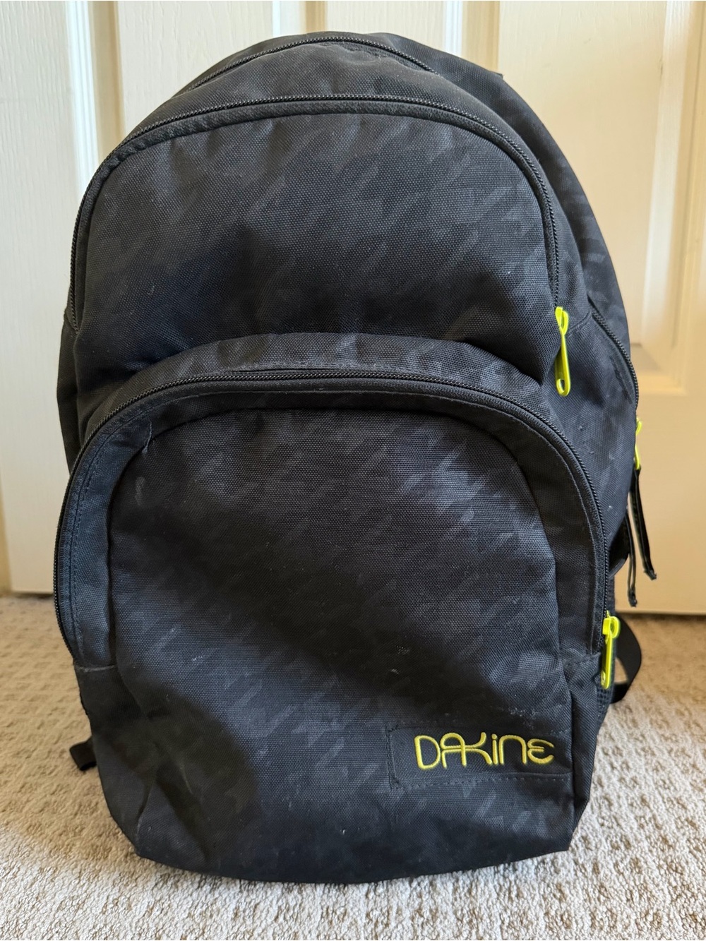 Dakine Black Backpack with Neon Yellow Accents